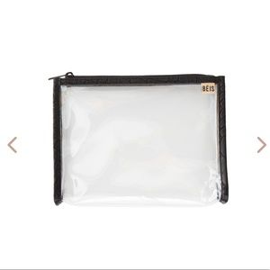 Béis clear travel pouch with black croc edging